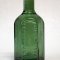 Gr�n flaske i genbrugsglas - lille